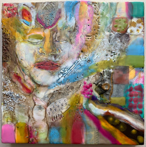 Title: She Slept For Centuries is painted using encaustic paint. There is a face in the upper left quadrant that is white and yellow with red lips. The background resembles a textured patchwork quilt.